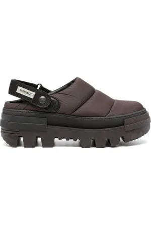 Premiata Mules acolchados con tira trasera