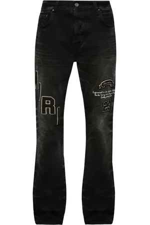 AMIRI Vaqueros con parche del logo