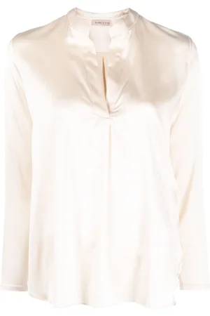 BLANCA Blusa con cuello en V