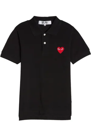 Comme des Garçons Polo con parche del logo