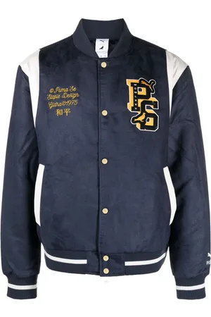 PUMA Chaqueta varsity con parche del logo de x Staple