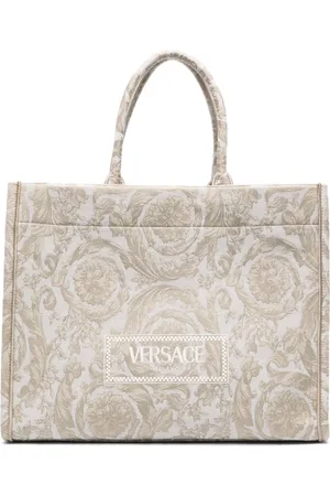VERSACE Pantalones con dobladillo acampanado