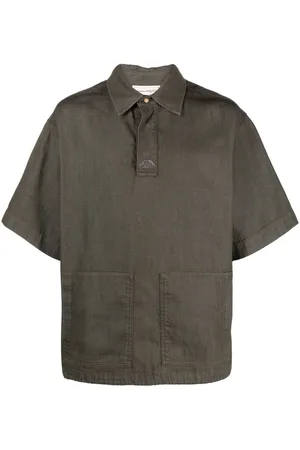 Alexander McQueen Polo vaquero con logo bordado