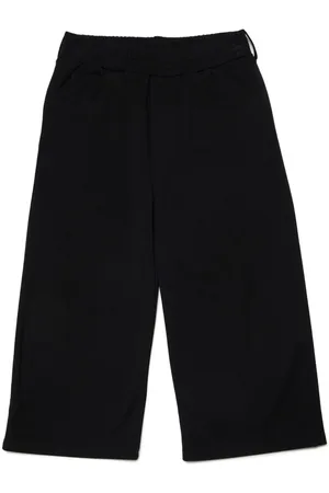 Maison Margiela Pantalones con logo estampado