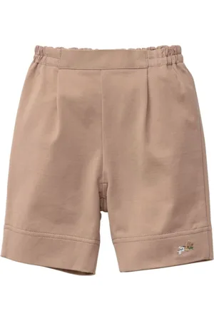 Familiar Pantalones acampanados con motivo bordado