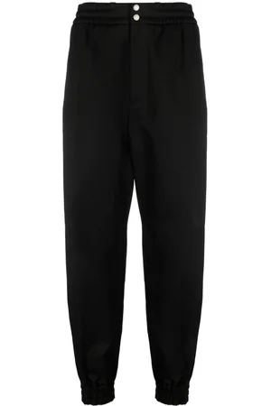 Alexander McQueen Pantalones ajustados con botones