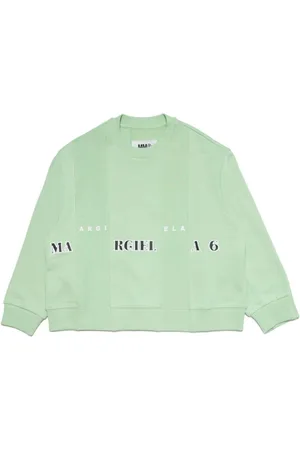 Maison Margiela Pantalones acampanados con logo bordado