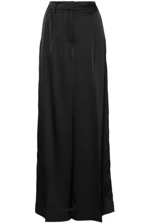REMAIN Pantalones anchos