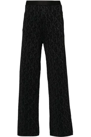 Palm Angels Pantalones acampanados de punto