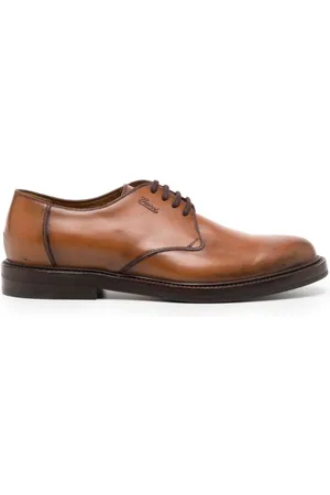 Gucci Zapatos Derby con logo en relieve