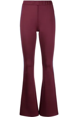 Izzue Leggins acampanados con raya lateral