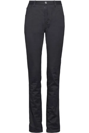Maison Margiela Vaqueros skinny con estampado Invitation
