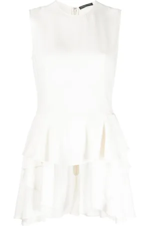 Alexander McQueen Blusa con dobladillo peplum asimétrico 2010