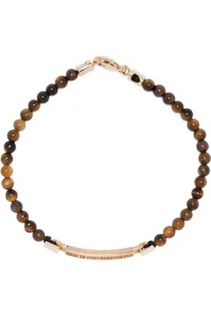 LUIS MORAIS Pulsera en oro amarillo de 14 kt con gemas