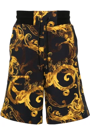 VERSACE Pantalones cortos de chándal con estampado Barocco