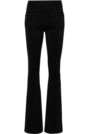 Palm Angels Pantalones acampanados con monograma