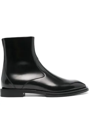 Alexander McQueen Botas con tacón y logo grabado