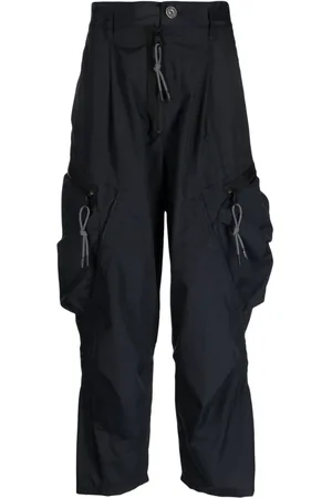 MOSTLY HEARD RARELY SEEN Pantalones de tiro caído