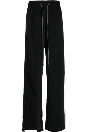 MOSTLY HEARD RARELY SEEN Pantalones chinos con detalle de rayas