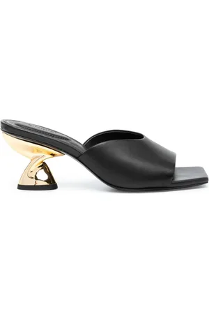 Simkhai Mules Nixxi con diseño retorcido