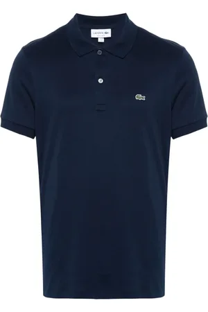 Lacoste Polo con parche del logo
