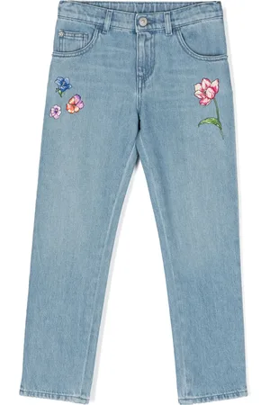 VERSACE Vaqueros skinny con bordado floral