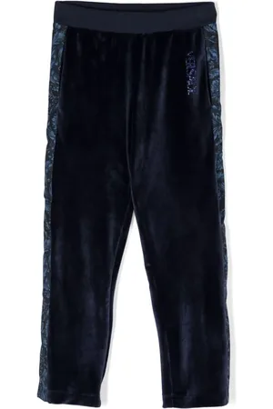 VERSACE Pantalones con estampado Barocco