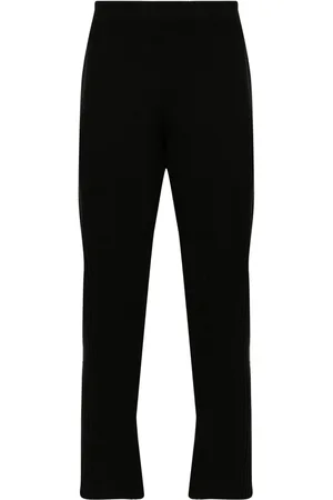 Issey Miyake Pantalones ajustados de punto Rustik