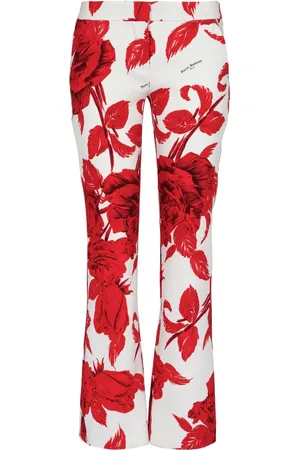Balmain Pantalones acampanados con rosa estampada