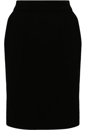 CHANEL Falda corta con botones 1990
