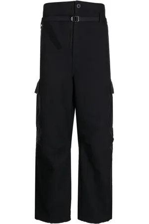 Comme des Garçons Pantalones anchos con bolsillos cargo