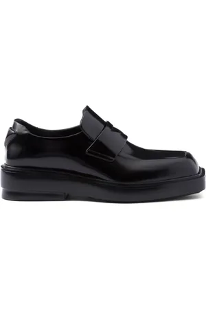 Prada Mocasines con parche