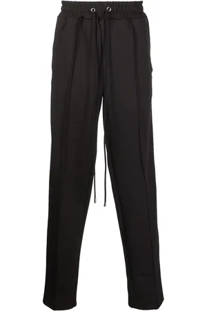 DOMREBEL Pantalones de chándal con franja del logo