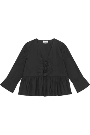 Ganni Blusa con peplum