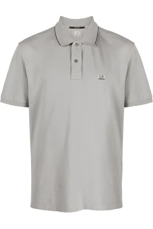 C.P. Company Polo con parche del logo