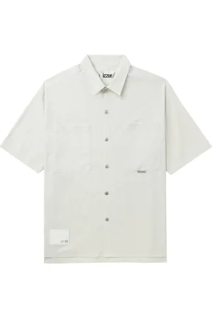 Izzue Polo con bolsillo de parche