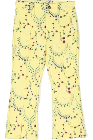 John Richmond Pantalones acampanados con estampado de joyas