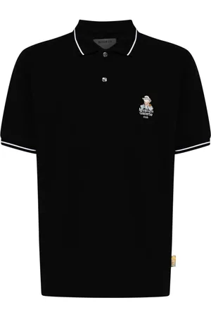 Musium Div. Polo con logo bordado