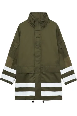 Comme des Garçons Parka con ribete a rayas
