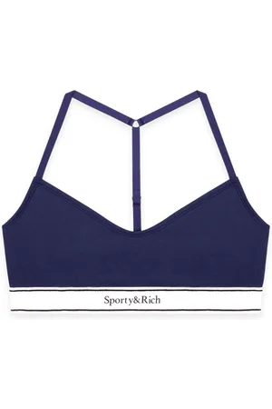 Sporty & Rich Corpiño deportivo con logo serif