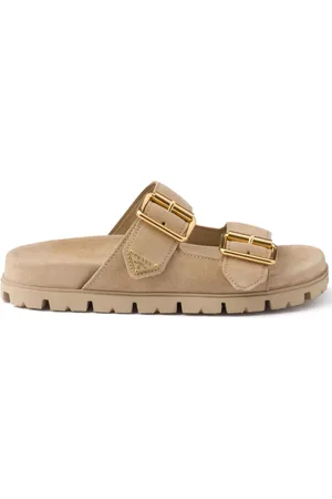 Prada Slippers con logo triangular