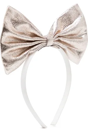 HUCKLEBONES LONDON Diadema con lazo metalizado