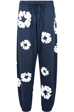 DENIM TEARS Pantalones de chándal con estampado Cotton Wreath