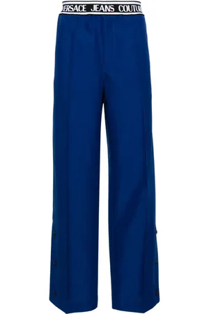 VERSACE Pantalones anchos con logo en la cinturilla