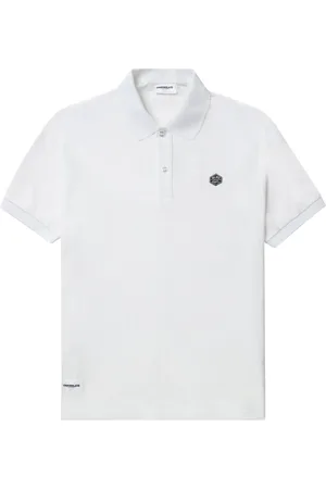 Chocoolate Polo con aplique del logo