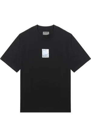 Musium Div. Camiseta con estampado gráfico