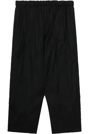 Comme des Garçons Pantalones capri de tiro caído