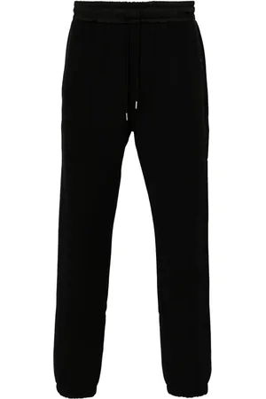 Saint Laurent Pantalones de chándal con logo bordado