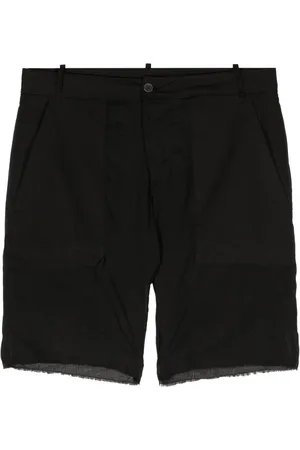 MASNADA Shorts deshilachados