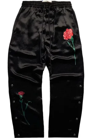 SONG FOR THE MUTE Pantalones de chándal con aplique floral